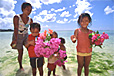 Gathering Flowers on the Beach