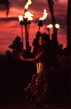 Beautiful Hula Dancer in the End of the Sunset at Waikiki Beach