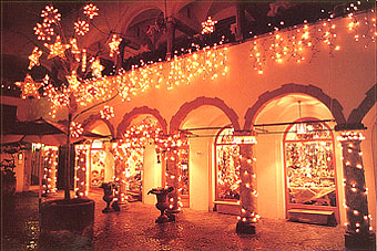 A small plaza appears suddnly through the old arcade. Salzburg