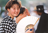an avid fan with a fan